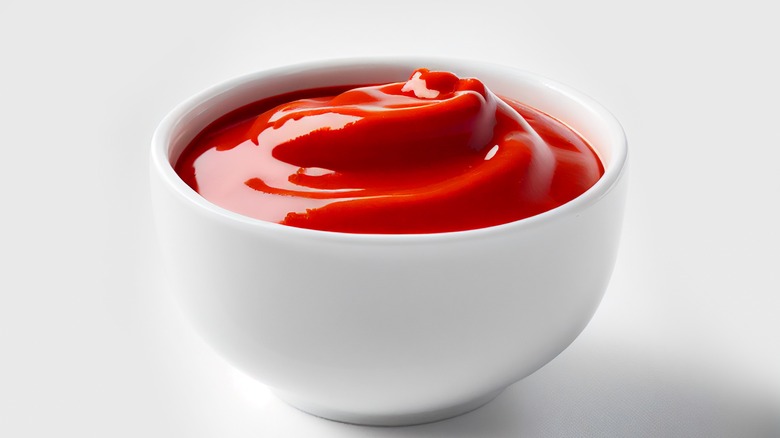Ketchup in white bowl