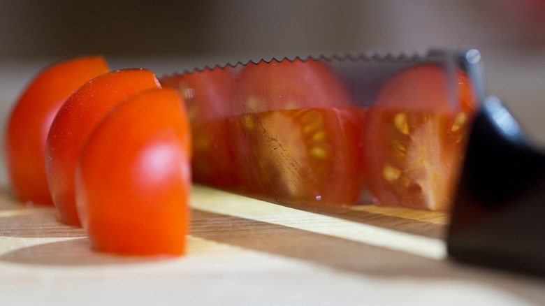 Serrated knife chopped tomato