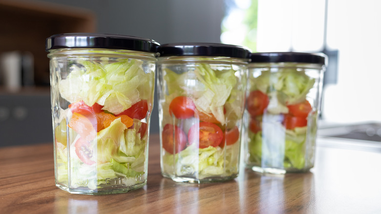 Salad ingredients in jar
