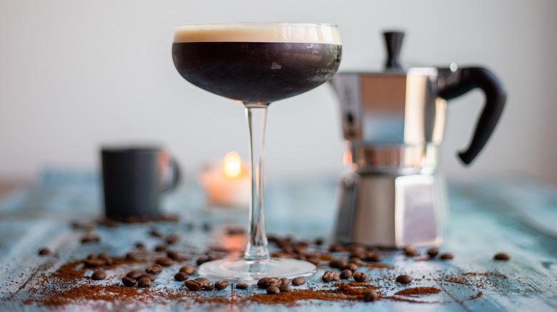 Espresso martini cocktail with coffee pot