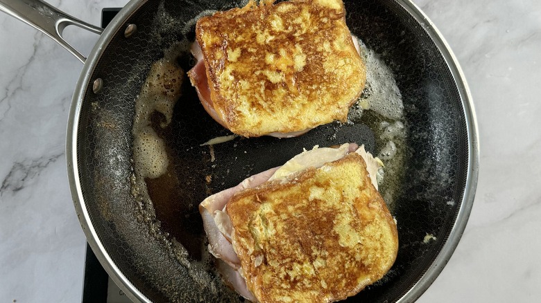 browned sandwiches in skillet