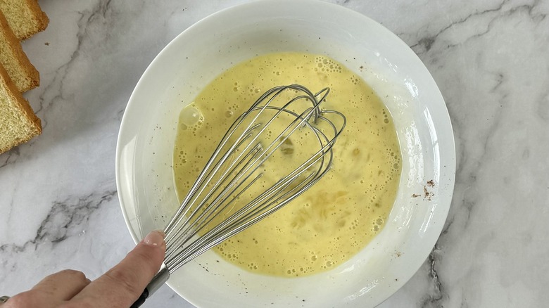 whisking eggs and cream