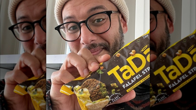 Founder holding TaDah falafel package