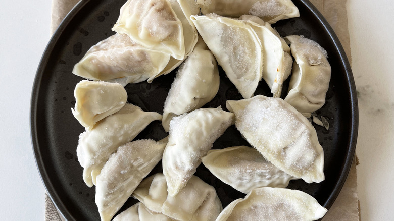 Frozen dumplings on a white background