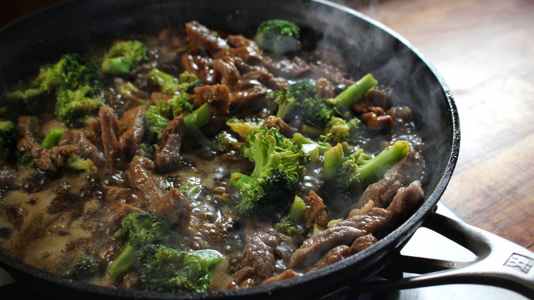 beef and broccoli in pan