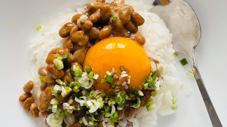 raw egg on japanese rice with natto