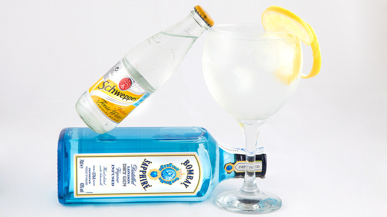Bombay sapphire bottle and a gin and tonic