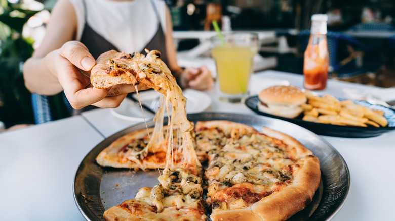 Dinner of pizza and burgers