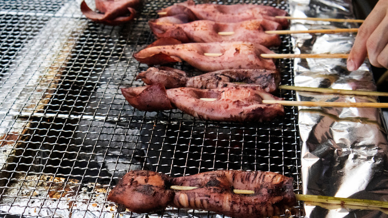 Grilled squid teriyaki over a grated grill