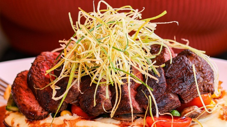 steak with garnish on plate
