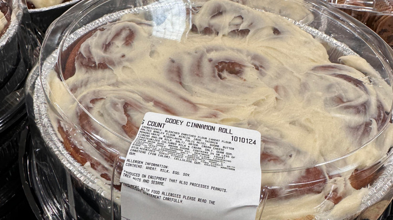 frosted cinnamon rolls in plastic container