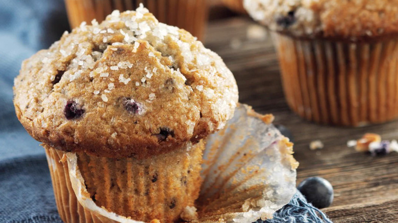 blueberry muffin on table