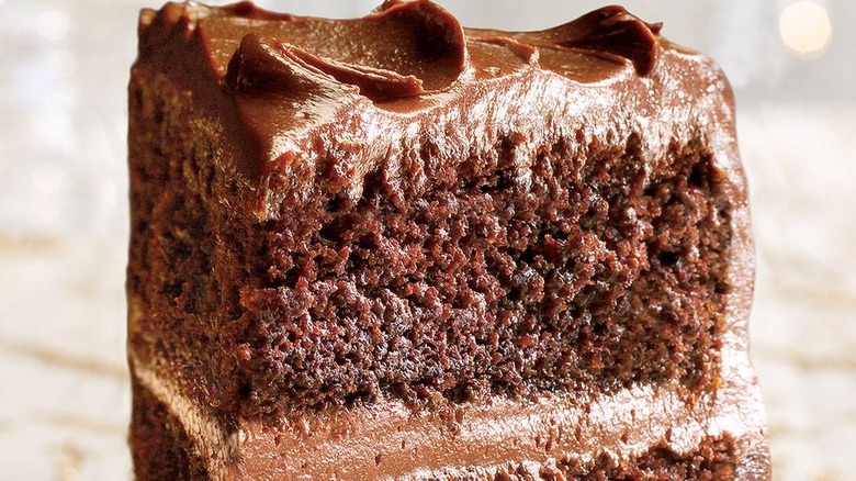 slice of chocolate cake with chocolate icing