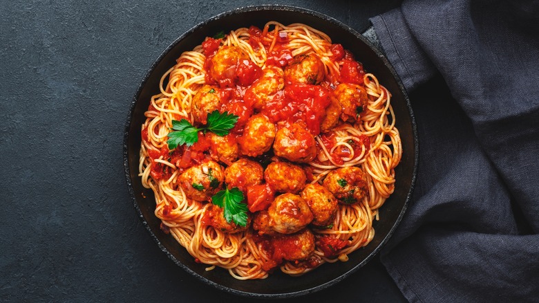 Meatballs over spaghetti