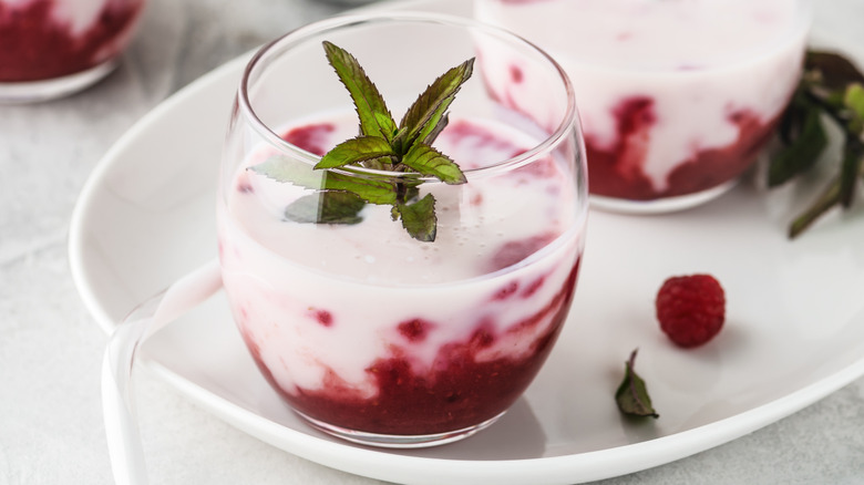 Buttermilk with pureed fruit in a glass with a mint spring