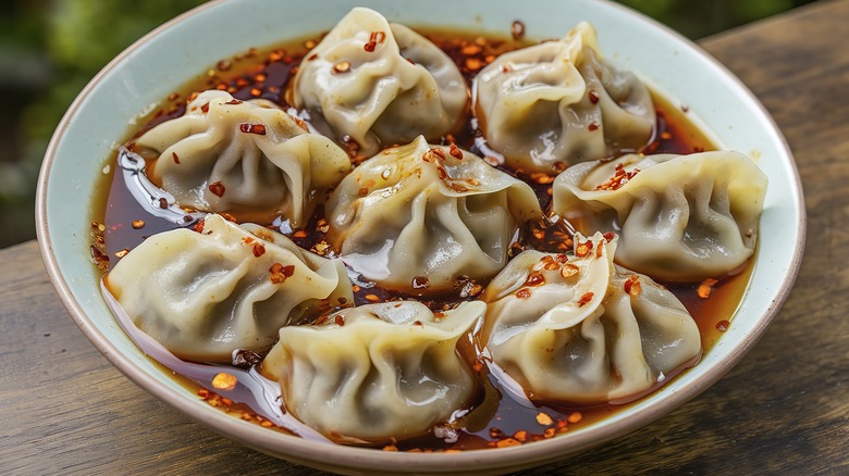 Bowl of dumplings in chili oil