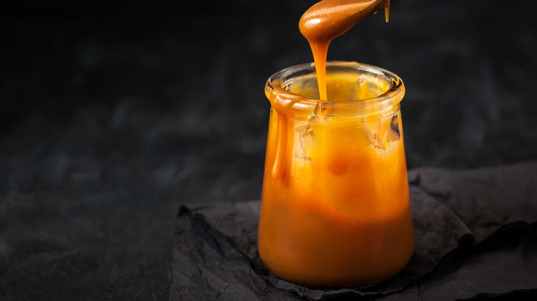 jar of homemade caramel sauce