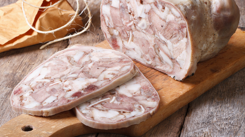 sliced guanciale on cutting board