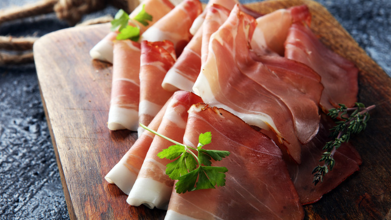 Prosciutto slices with parsley