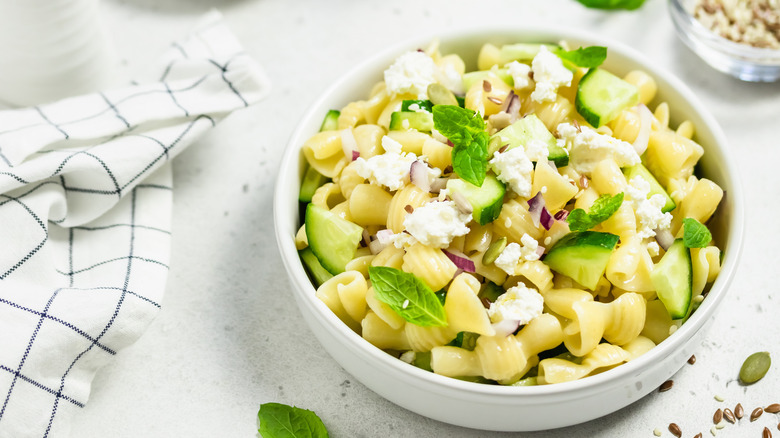 Pasta salad with mint, cucumbers, feta, and red onion