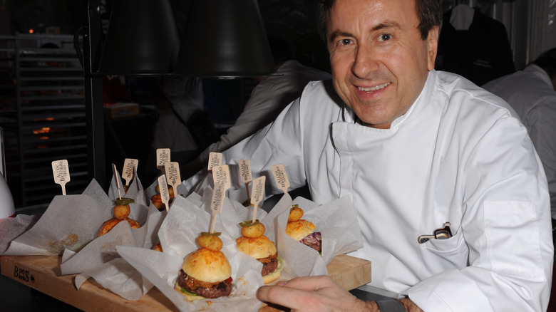 Daniel Boulud with burgers on potato buns