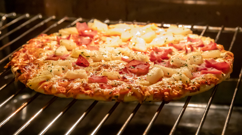 Frozen pizza in an oven