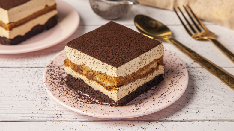 A slice of tiramisu served on a plate.