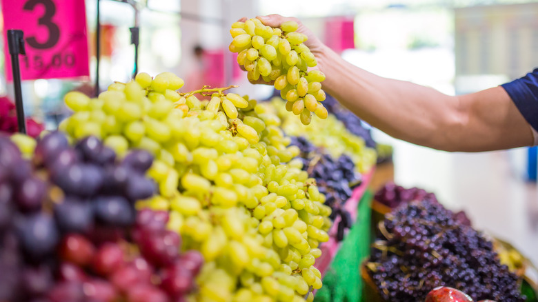 bunches of grapes at grocery store