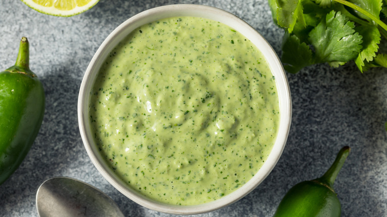 Bowl of creamy green jalapeño guacachile