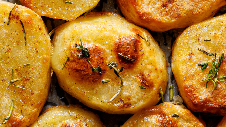 uniformly sized baked potatoes