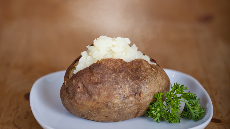 steaming freshly baked potato