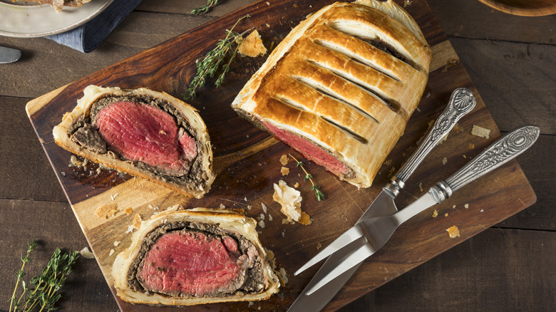 beef Wellington on a cutting board