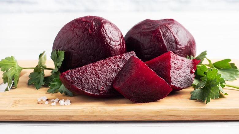 Boiled beets on cutting board