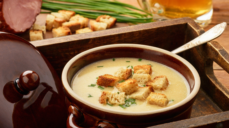 Bowl of beer cheese soup with croutons