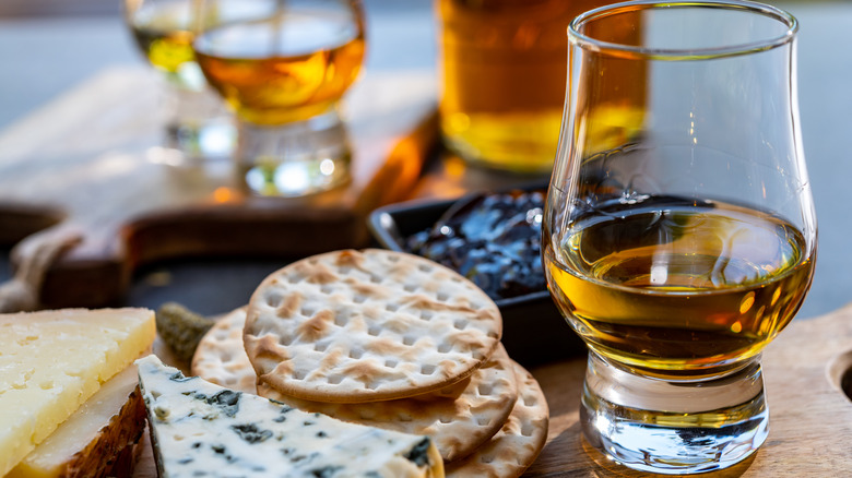 whiskey on a cheese board