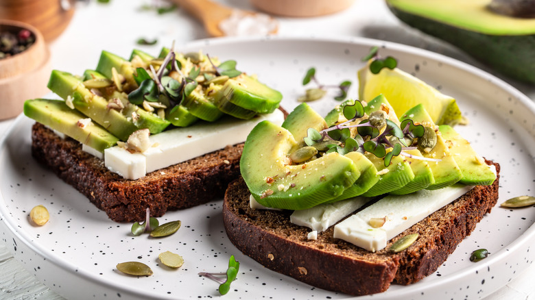 The Best Cheeses To Give Avocado Toast A Creamy Boost