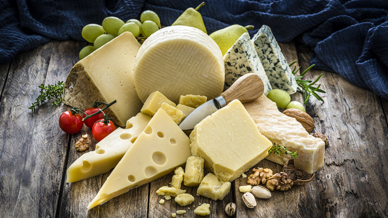 selection of cheese on wooden table