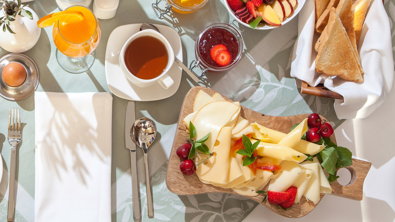 Assorted cheese, bread, coffee