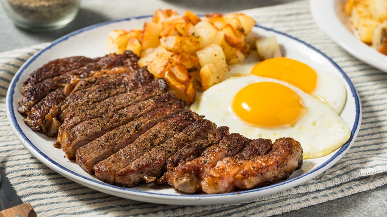 Steak and eggs with breakfast potatoes