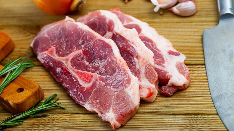 Raw pork shoulder slices