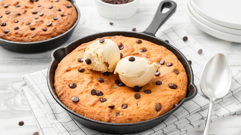 Chocolate chip cookie in cast iron skillet