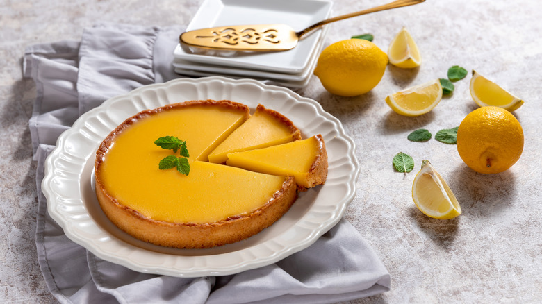 Lemon tart on white serving platter