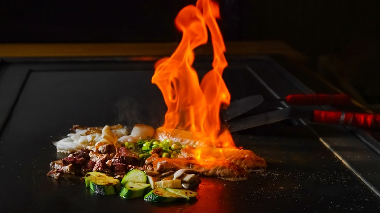 A flaming variety of hibachi foods