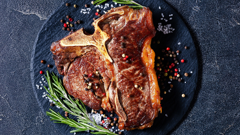 seared t-bone steak with aromatics