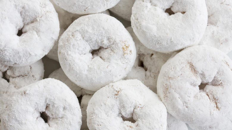 Donuts coated in powdered sugar