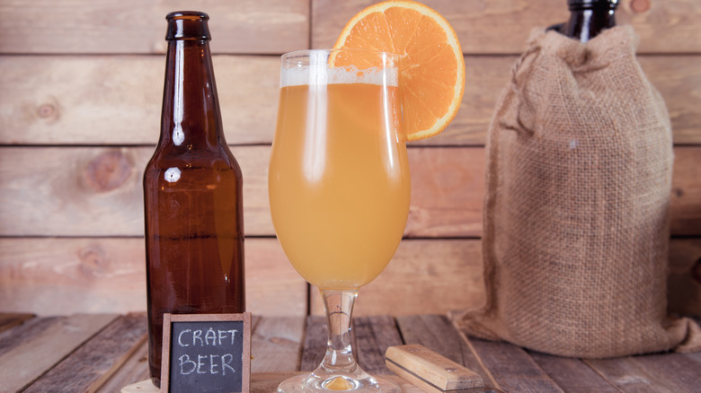 Belgian-style Wheat beer served with orange slice 