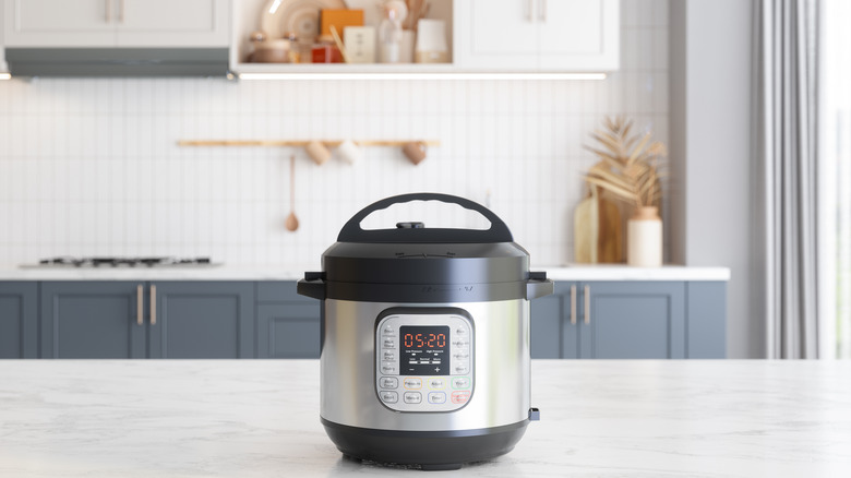 Slow cooker on kitchen countertop