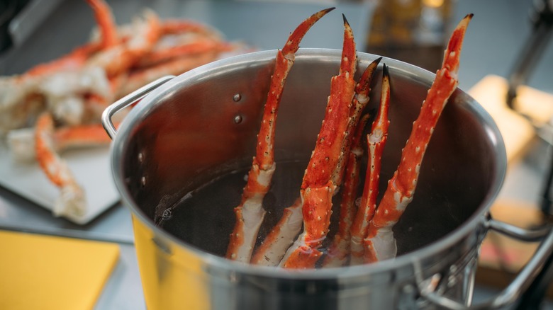 crab legs in a pot