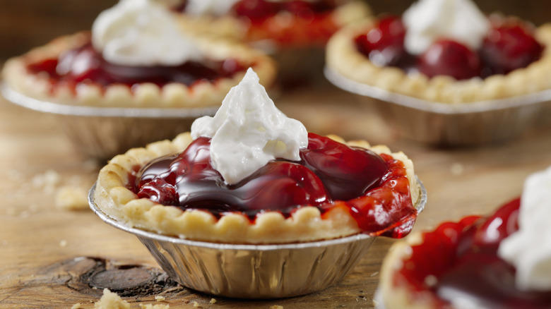 mini cherry pies with whipped cream