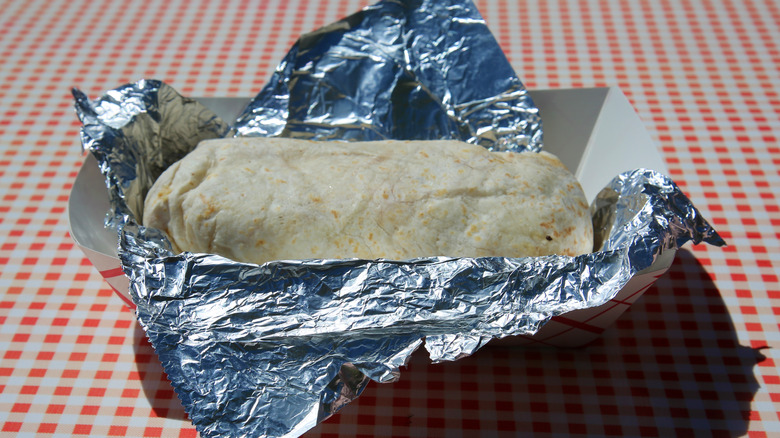 unwrapped burrito on foil